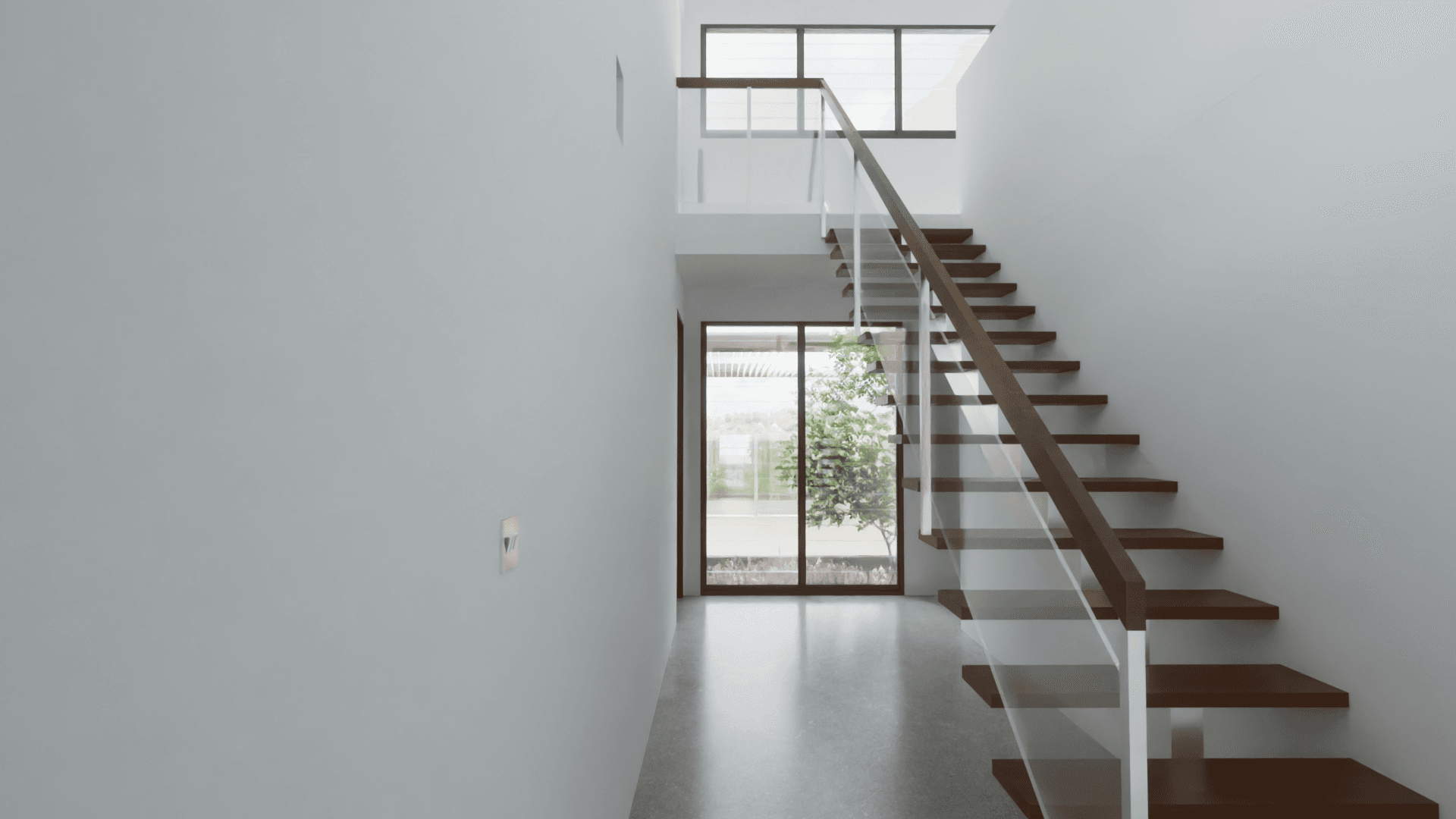 House 2 entry, stairs to beds and study, window views through to the back yard