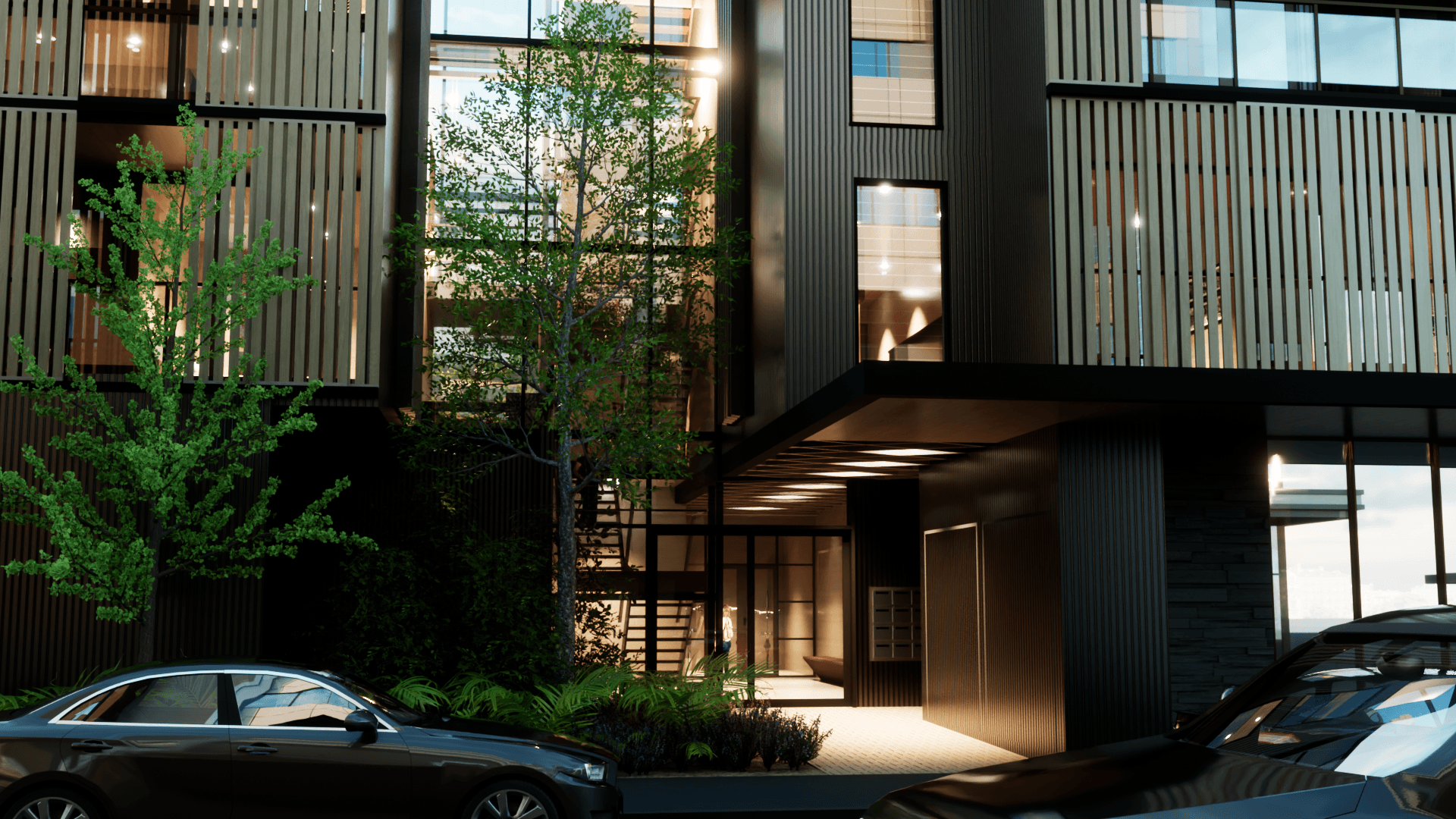 Residential street entry - the fully glazed circulation space separates the "apartment" section from the "townhouse" section